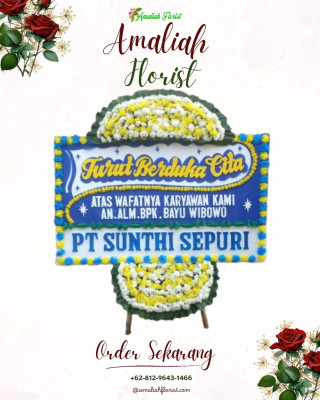 Papan Bunga Duka di Tengah Ilir